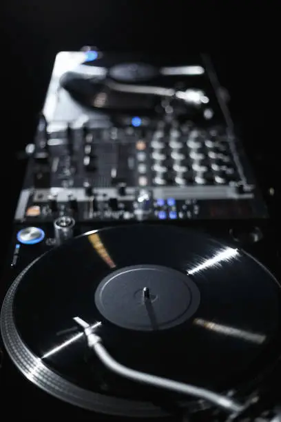 Professional dj audio equipment on hip hop party in night club.