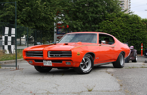 New Westminster, Canada – July 04, 2021: Red Pontiac GTO (1969) car at New Westminster, British Columbia, Canada