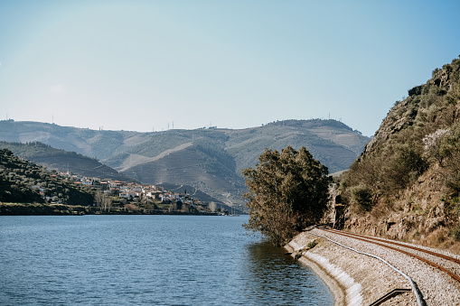 A beautiful view of the shores of Porto and Regua near the Douro River on a sunny day