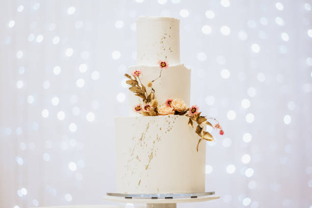 istock Beautiful wedding cake decorated with flowers 1440982858