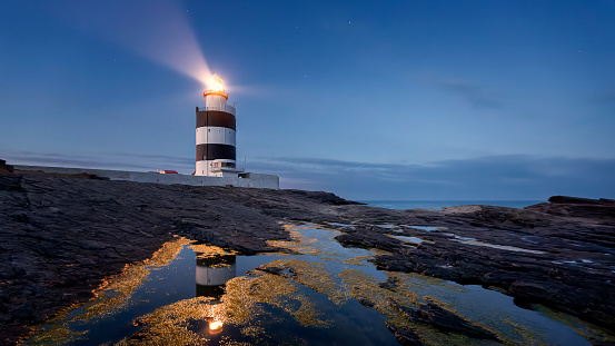 An evening scene of the Hook Head Lighthouse in County Wexford, Ireland
