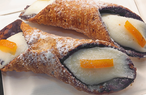 Sicilian cannoli typical pastries from Southern Italy made with ricotta Cheese