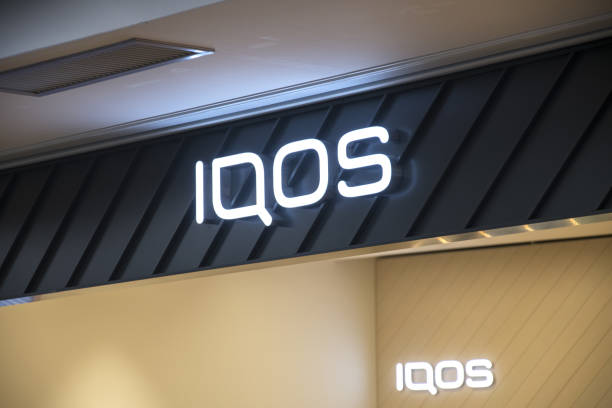 Iqos Sign Osaka Kansai Airport (KIX) Osaka, Japan – December 10, 2019: Osaka, Japan- 03 Dec, 2019: Iqos Sign Osaka Kansai Airport (KIX). IQOS is a tobacco heating system iqos e cig stock pictures, royalty-free photos & images