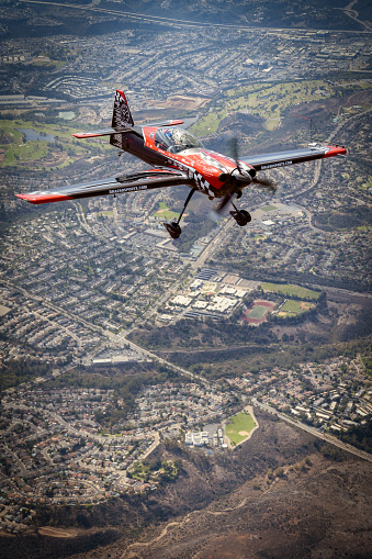 San Diego, California, USA - September 24, 2022: Airshow legend Rob Holland flies over the city during the 2022 Miramar Airshow.