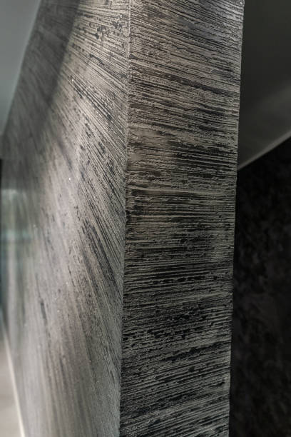 istock Vertical shot of a gray, patterned, inside wall - for backgrounds and textures 1440985985