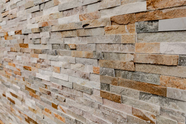 istock Closeup of a wall with red and gray bricks 1440986024
