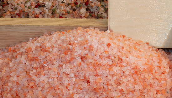 sale of coarse pink salt typical of the Himalayas areas for sale at the market