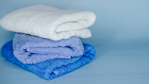 istock multicolored terry towels on a blue background 1440988116