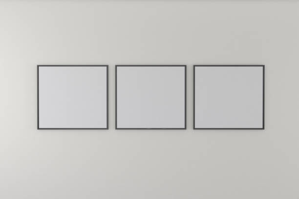 istock Closeup shot of three black frames on a white wall 1440990253