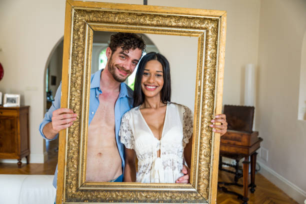 istock Happy interracial couple at home 1440990410