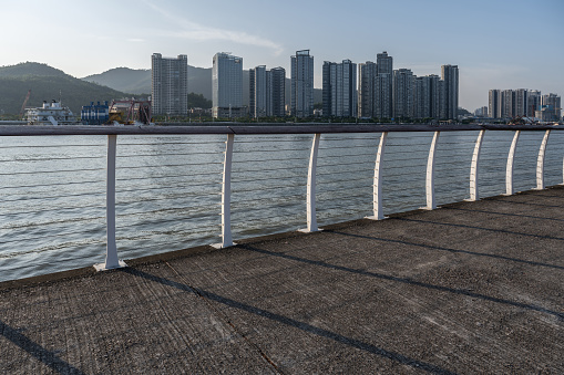 The seaside square and the city across the sea