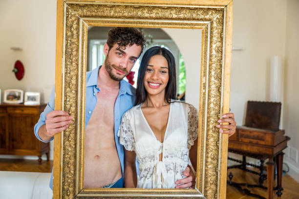 istock Happy interracial couple at home 1440991925
