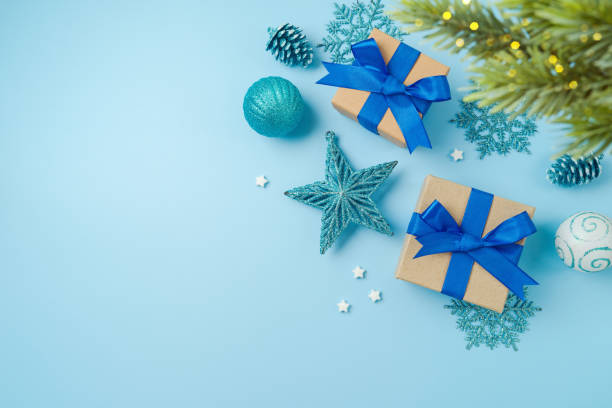 istock Merry Christmas background with gift boxrs and blue decorations. Top view, flat lay 1440992379