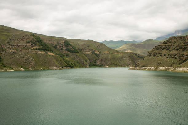 istock mountain lake Gizhgit among green hills 1440993130