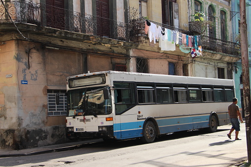 cuba - la havana - old havana -August 7, 2019
 old cuban car -an old passenger coach parks in an alley in the old historic center of havana