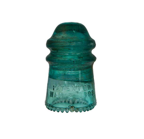 1890s green glass electrical insulator.
