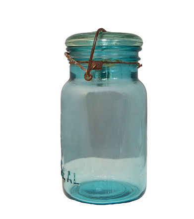 Antique blue/ green glass canning jar with rusted wire cap locking mechanism