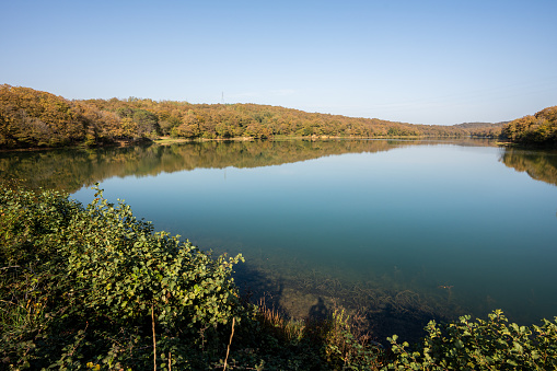 Lago di Barrea (Lake of Barrea) in the Abruzzo National Park, Italy, surrounded by mountains. Photo was taken from the village of Barrea, Province of L'Aquila, Italy