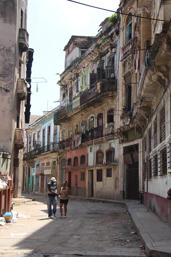 cuba - La Havane - Old Havane -08.07.2019 -  little street in the old town - old buildings - alley in the old historic center of havana with its colonial style buildings, destroyed and poorly maintained, as well as passers-by strolling