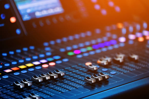 Concert sound mixer panel with volume regulators. Professional audio and light equipment for sound recording studio, live music broadcasting, television, party. mixing console. audio signals