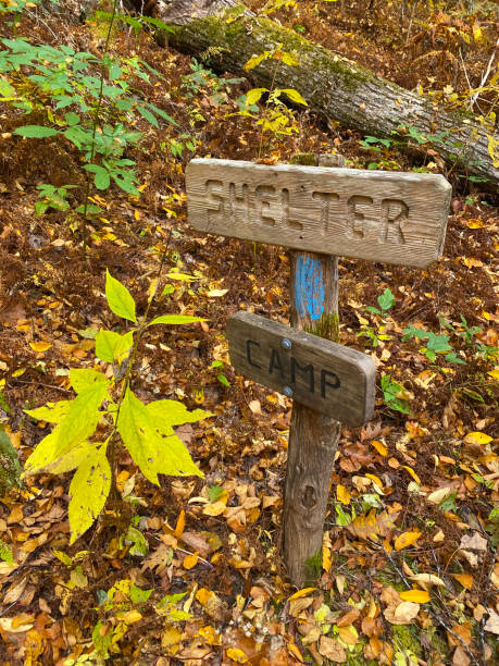 istock Shelter and Camp trail marker sign 1440997456