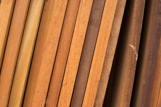istock Stacked tropical wooden timber 1440999196