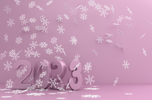 Happy new year 2023. Snow flakes falling on number 2023 on a pink background