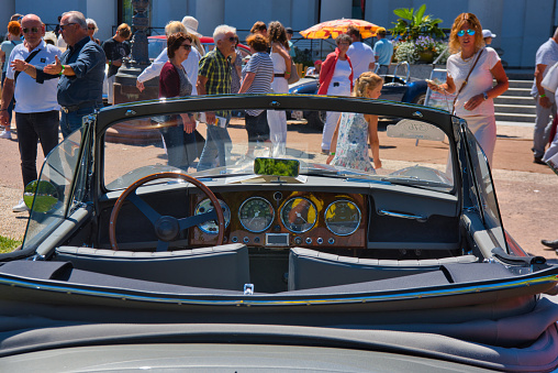 Baden-Baden, Germany - 10 July 2022: interior of silver 1956 Aston Martin DB2 4 2.9 Litre Drophead Coupe cabrio which is parked in Kurpark in Baden-Baden at the exhibition of old cars 