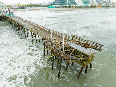 Aerial photo of the Daytona Beach pier damaged during Hurricane Nicole