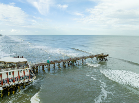 Aerial photo of the Daytona Beach pier damaged during Hurricane Nicole