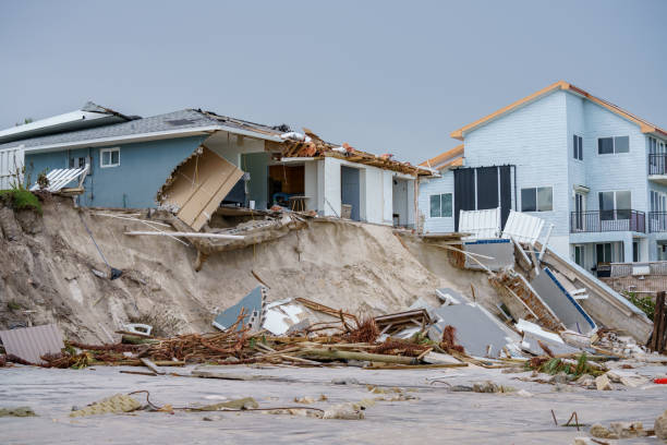 Luxury beach homes collapse under heavy waves caused by Hurricane Nicole Daytona Beach FL stock photo