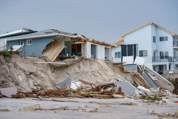 Luxury beach homes collapse under heavy waves caused by Hurricane Nicole Daytona Beach FL