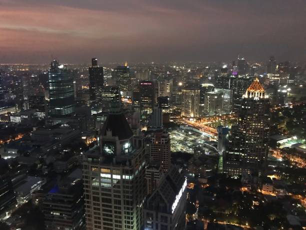 istock Bangkok cityscape with skyline at night time 1441002062