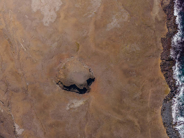 istock inactive crater from above on the coast 1441005730