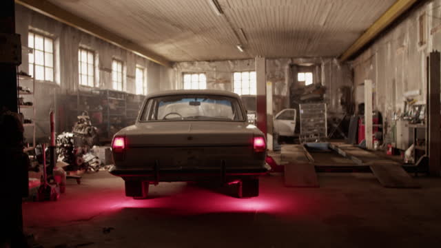 Garage with vintage car in daytime