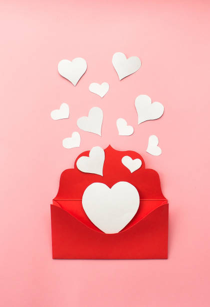 istock Red envelope and white hearts on pink background. Love concept. Saint Valentine's Day concept. Mother's day concept. Flat lay. 1441008769