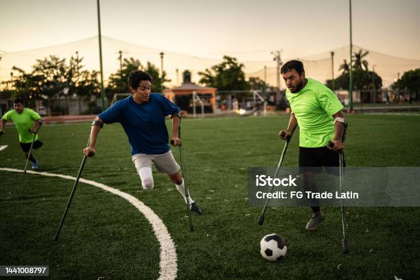 Amputee Soccer Players In A Match On The Soccer Field Stock Photo - Download Image Now