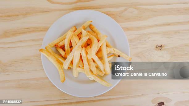 French Fries On A Plate Top View Wooden Table Stock Photo - Download Image Now - Backgrounds, Brazil, Close-up