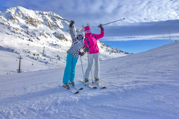 istock Girls on the ski slope in Austrian alps 1441011890