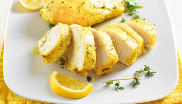 istock Sliced baked turmeric chicken breast 1441012228