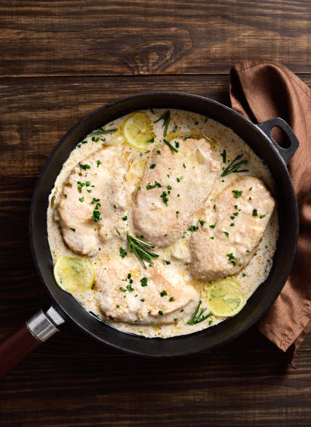 istock Chicken breast in creamy garlic sauce 1441012932