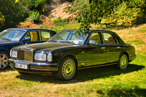 Baden-Baden, Germany - 10 July 2022: black Rolls-Royce Silver Seraph 1998 is parked in Kurpark in Baden-Baden at the exhibition of old cars \