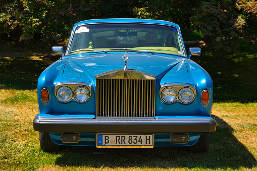 Baden-Baden, Germany - 10 July 2022: blue Rolls-Royce Silver Shadow sedan limousine 1965 1980 is parked in Kurpark in Baden-Baden at the exhibition of old cars \
