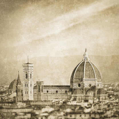 Digitally created old photo. Duomo di Firenze (Cathedral of Saint Mary of the Flower or Cattedrale di Santa Maria del Fiore in italian) and Giotto's Campanile. The cathedral possesses the largest brick dome in the world (created by Filippo Brunelleschi), and is considered a masterpiece of European architecture.