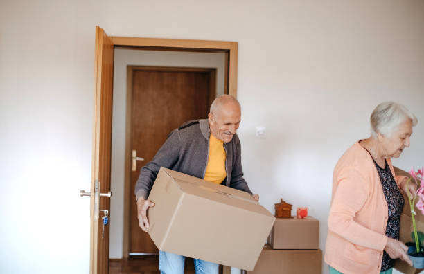 istock Multi-generation family moving in new apartment 1441015474