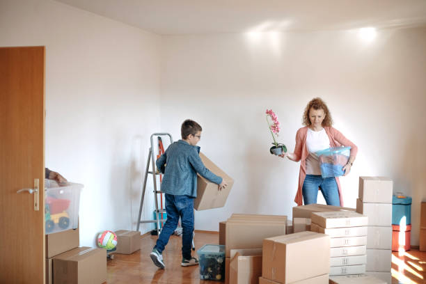 istock Multi-generation family moving in new apartment 1441015543