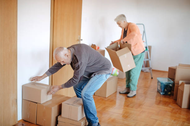 istock Senior couple moving in new apartment 1441015588