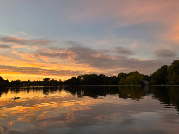 istock Sunset at the lake with beautiful orange sky 1441015733