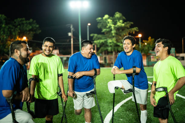 istock Amputee soccer players talking on soccer field 1441016426