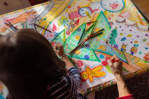 istock Creative family making a Christmas art 1441017540